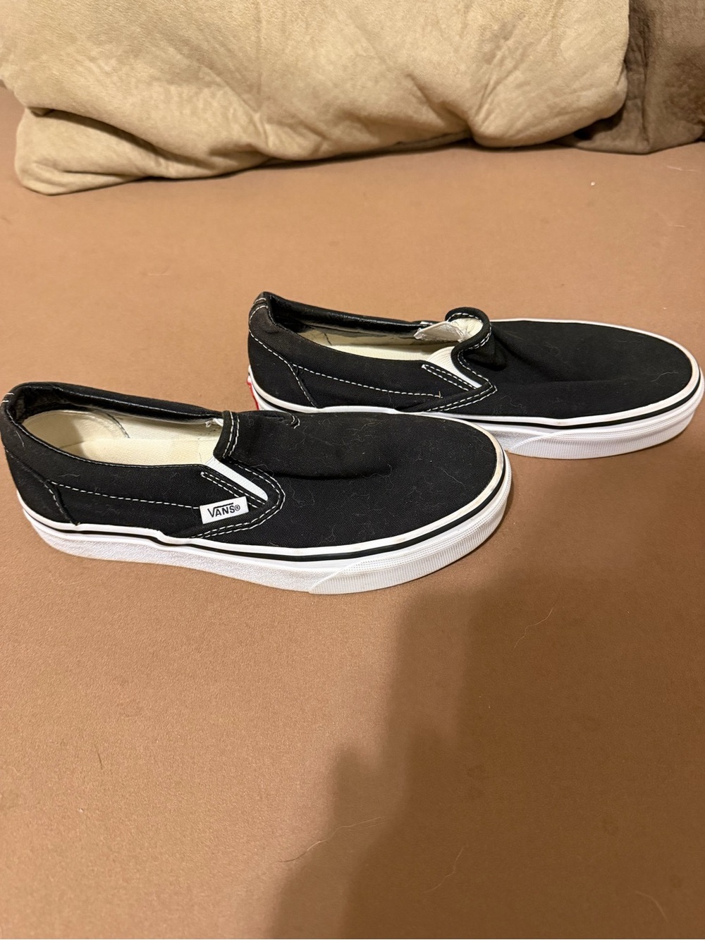 Vans Classic Slip-On Sneakers in Black & White
Size 6
Great condition
